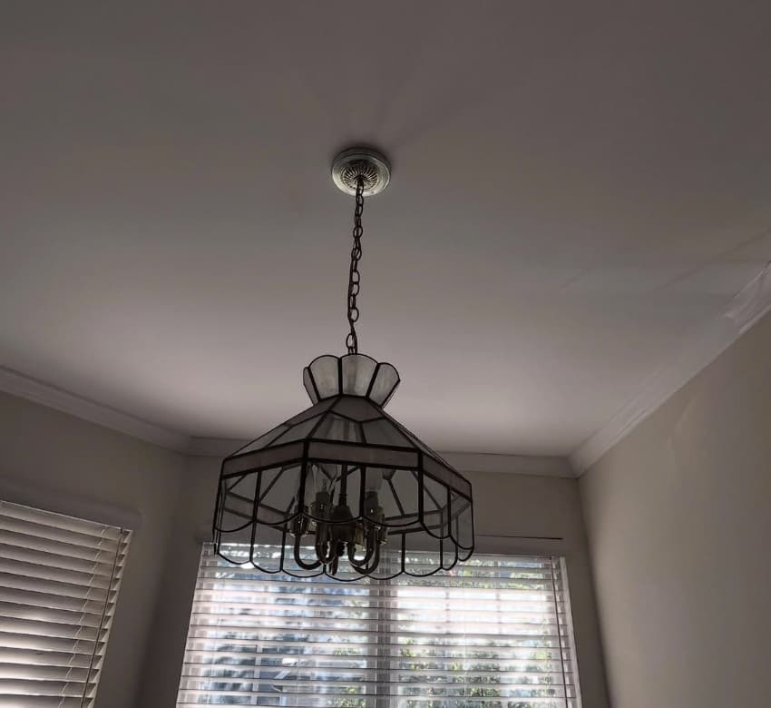 Before electrical work - showing outdated or damaged electrical fixtures