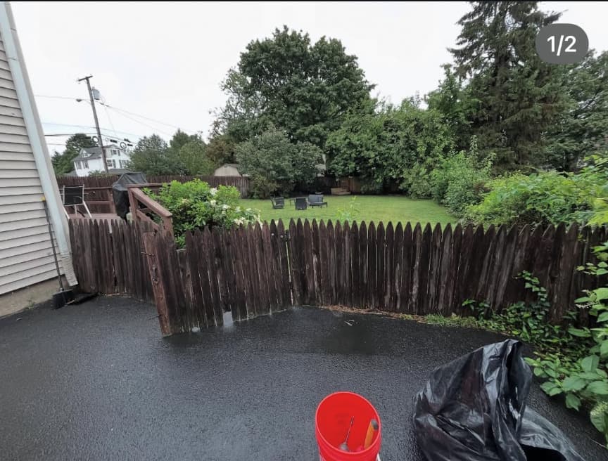 Before fence work - showing damaged or missing fencing